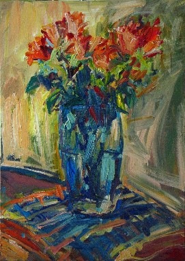 Blumen in blauen Glas