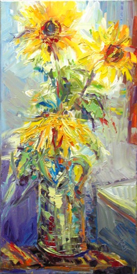 Sonnenblumen im grünen Krug