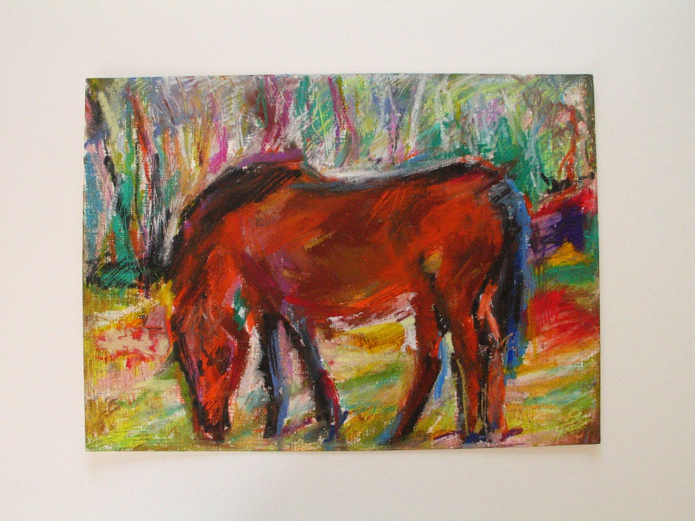 Grasendes Pferd