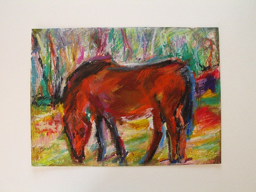 Grasendes Pferd