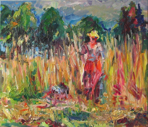 Frau in Graslandschaft
